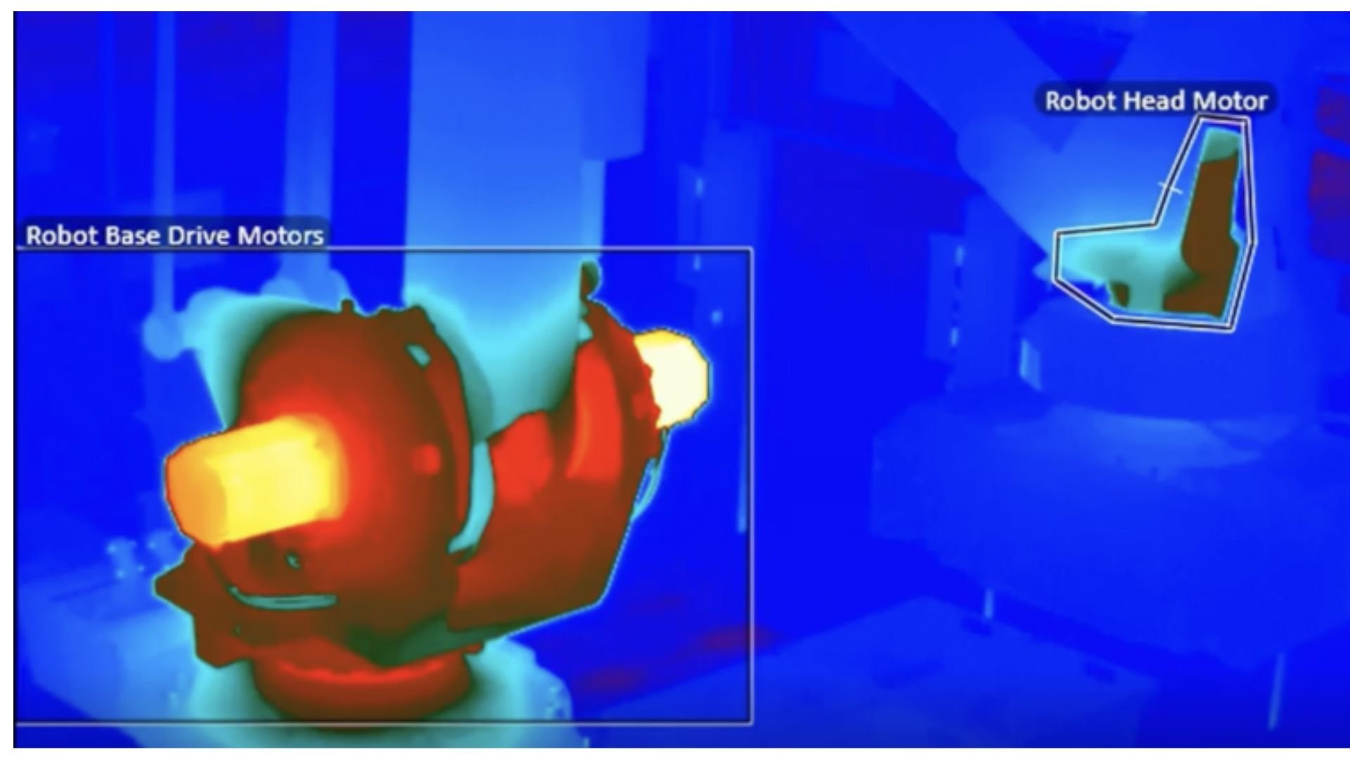 Thermal image of robotic cell drive motors and robot head motor showing elevated heat signatures associated with early mechanical or electrical degradation in automated manufacturing equipment. 