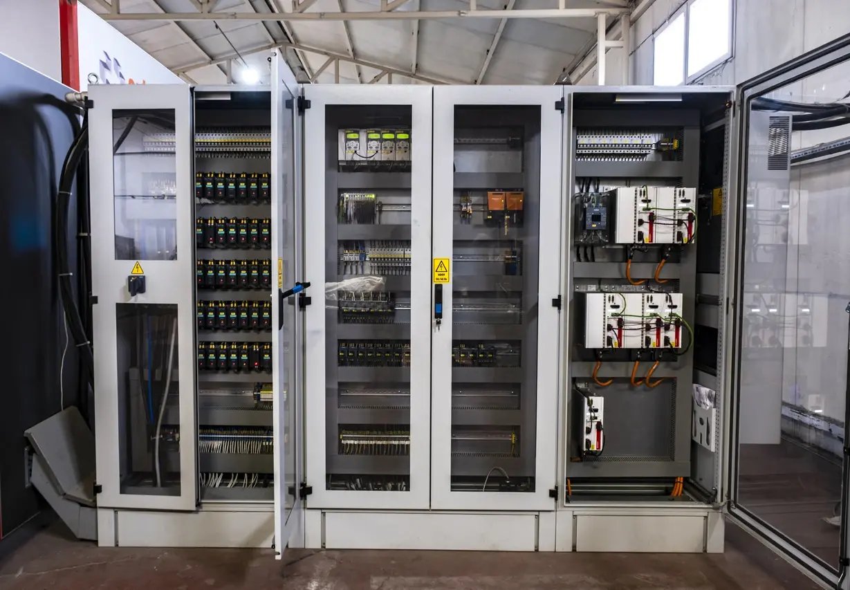 iStock-1399004684-PLc cabinet Factory Electric control panel enclosure for power and distribution electricity. Uninterrupted, electrical voltage.