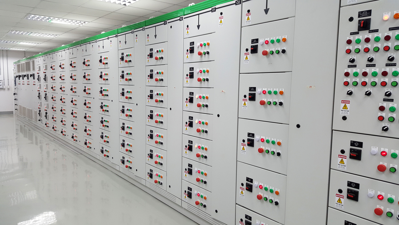 400-volt motor control center (MCC) panels inside an industrial electrical room used for condition monitoring of electrical systems, MCC monitoring, switchgear monitoring, and early electrical fault detection in automated operations.